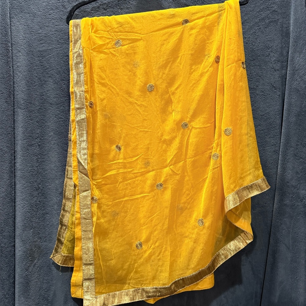 Vibrant Yellow Sari with Gold Accents